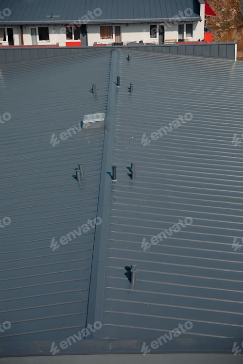 Preview: New tin roof on the apartment building. Watterproof roofing system