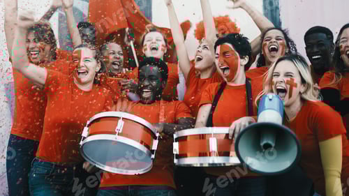Preview: Enthusiastic Fans Celebrating with Drums and Megaphone