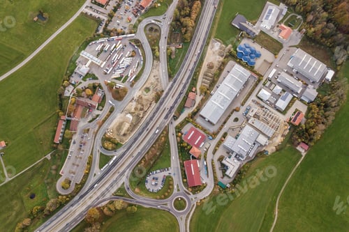 Preview: Top down aerial view of freeway interstate road with moving traffic cars in rural area.