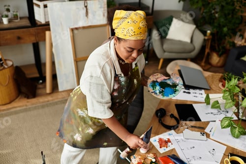 Preview: Crafting creativity shines as beautiful woman explores art in cozy workshop setting