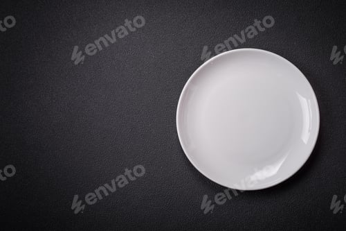 Preview: Bumpy empty ceramic plate on a textured concrete background