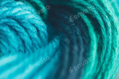 Preview: close up view of blue and green knitting yarn ball