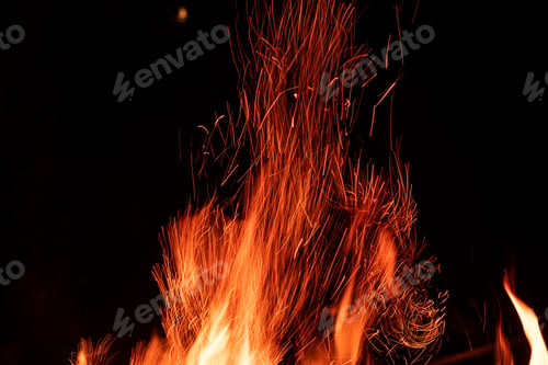 Preview: Campfire flame isolated on black background