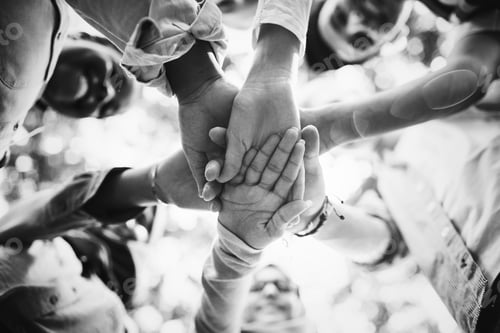 Preview: Group of diverse youth hands joined