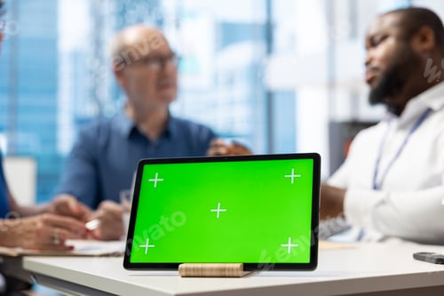 Preview: Advisor and elderly people exploring financial options in modern office