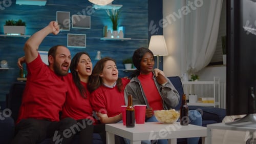 Preview: Happy multiethnic friends watching football game during sport competition