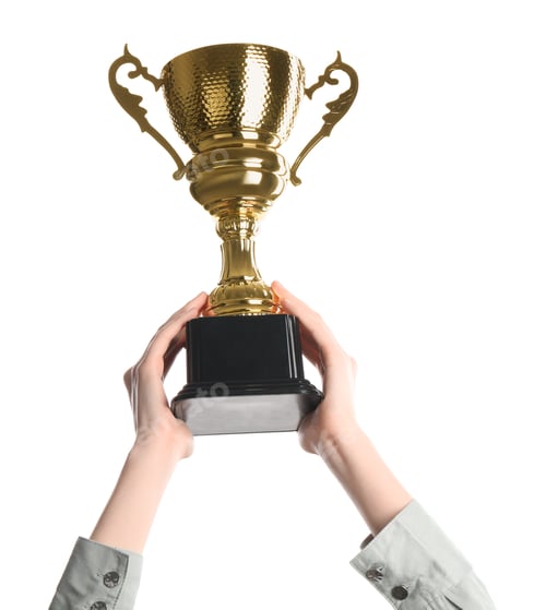 Preview: Woman holding golden trophy on white background, closeup