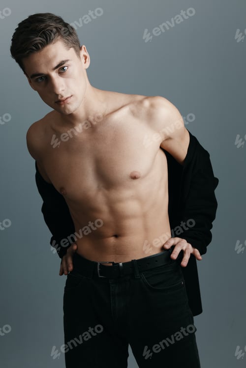 Preview: Gentleman in a jacket on a nude torso gray background cropped view
