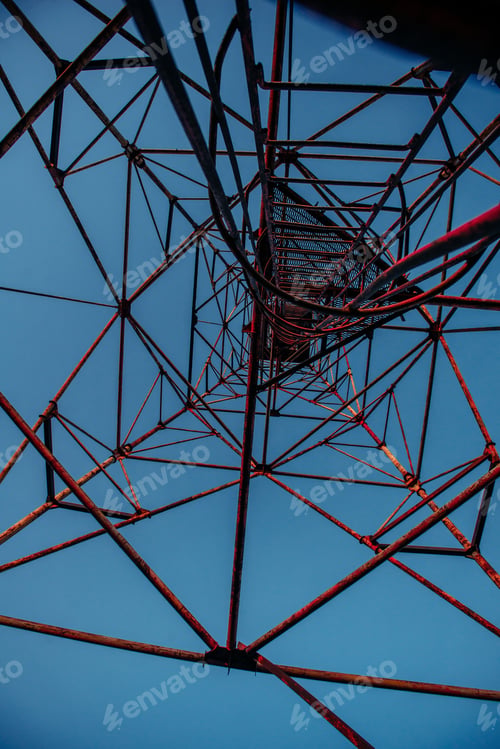 Preview: High metal tower on blue sky