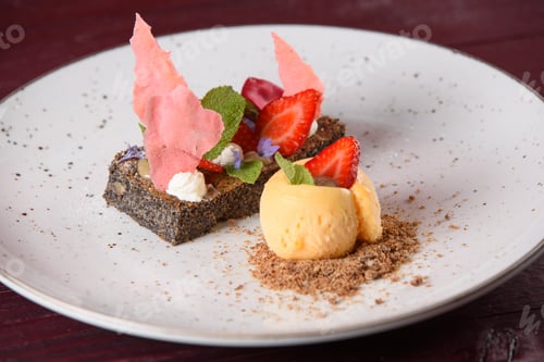 Preview: Poppyseed dessert with ice cream crumbs chocolate strawberries and mint