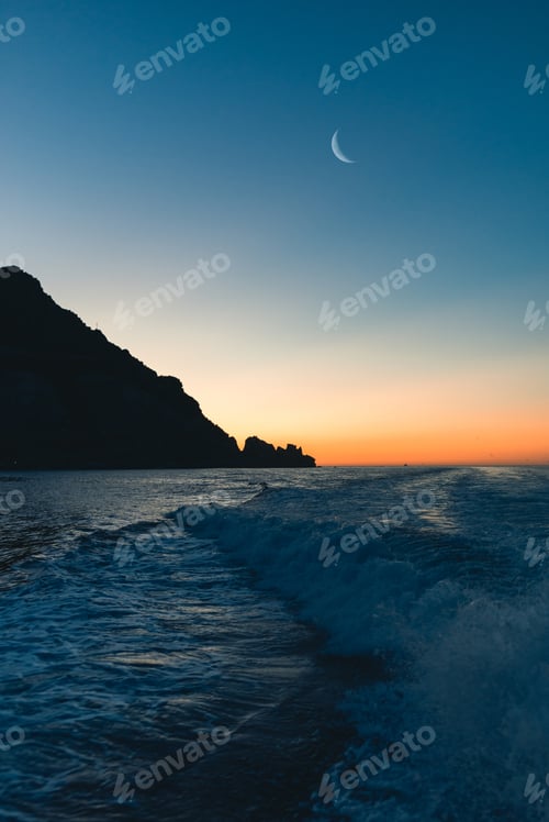 Preview: Motorboat wake at sunset light