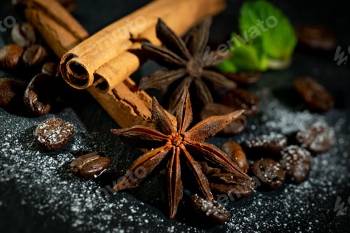 Preview: Closeup of cinnamon rolls with anise and coffee beans