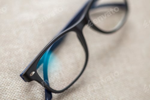 Preview: Reading spectacles, fashionable eyeglasses isolated on blurred white copy space background.