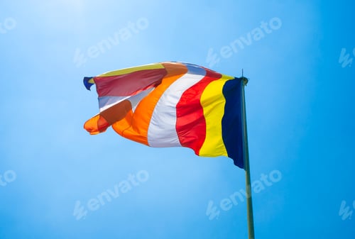 Preview: Buddhist Flag in cloudy blue sky