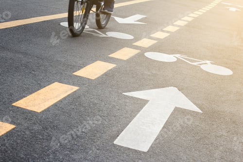 Preview: detail of urban bicycle track with biker coming