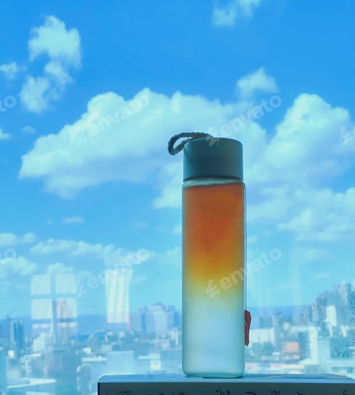 Preview: Homemade ice tea against cityscape