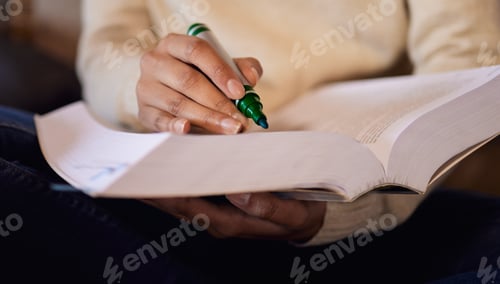 Preview: Cropped shot of a woman using a green marker while studying