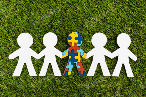 Preview: Top view of special kid with autism among another on green background