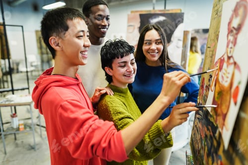 Preview: Multiracial students painting inside art room class at university - Focus on center girl face