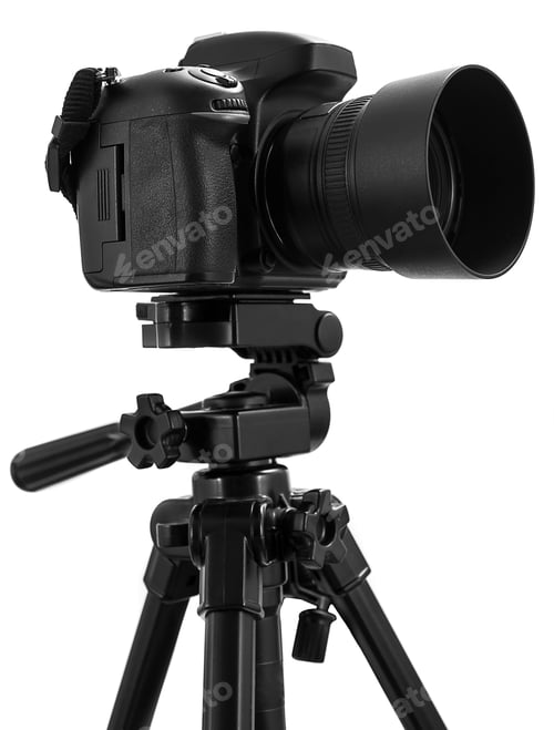 Preview: Photo camera on tripod isolated at white background