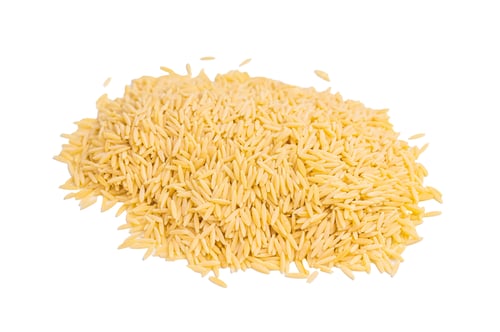 Preview: Pile of Uncooked Orzo pasta, raw dry Italian risoni isolated on white background. top view