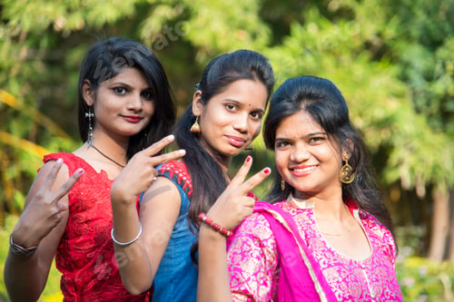 Preview: Happy Indian young girls smiling and having fun at outdoor.