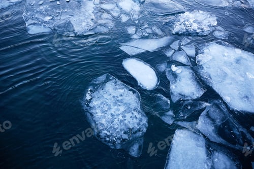 Preview: Ice floes in the water. Natural background.