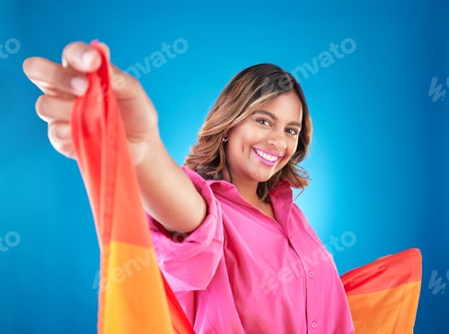 Preview: LGBTQ woman, flag and studio portrait with beauty, peace and freedom with pride for inclusion by bl