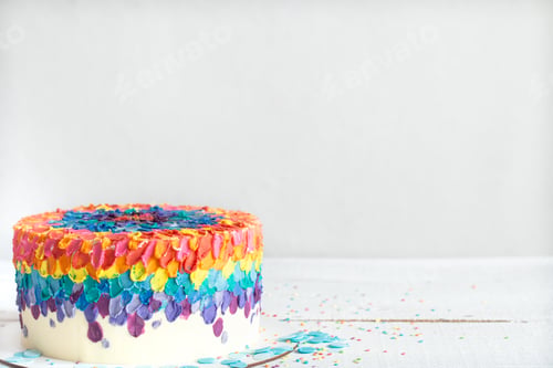 Preview: Colorful big handmade birthday cake copy space.