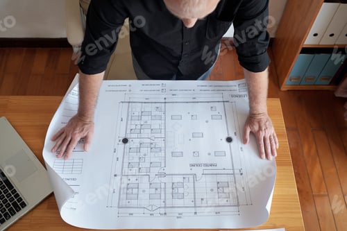 Preview: Engineer Examining Construction Plan