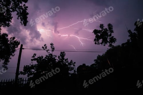Preview: Cloud to Cloud Lightning over the Roof Tops
