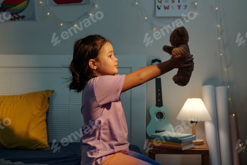 Preview: Girl Playing With Her Toy