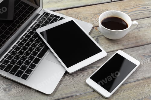 Preview: Open laptop with digital tablet and smartphone close up