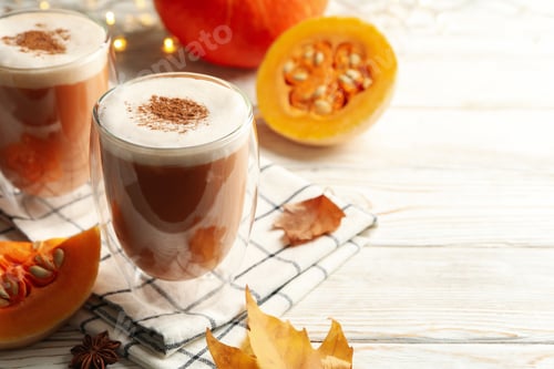 Preview: Composition with pumpkin latte on white wooden table