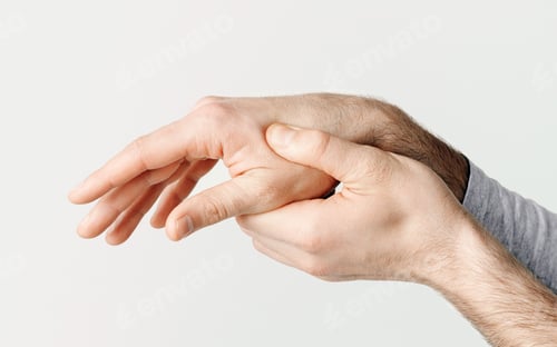 Preview: Fracture, injury or pain in arm. Man presses one hand with other