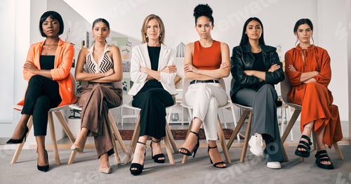 Preview: Were all bosses. Shot of a group of businesswomen sitting in a row in an office at work.