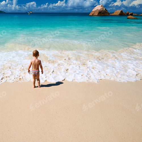 Preview: Two Year Old Baby Boy Playing On Beach At Seychelles