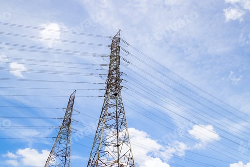 Preview: High voltage power line and pylon on blue sky