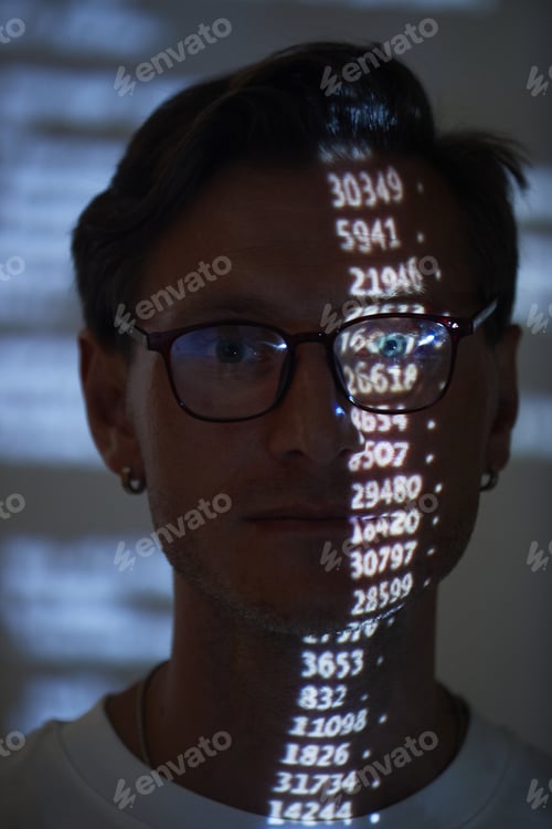 Preview: Computer hacker examining numbers