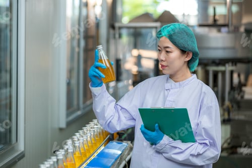 Preview: Worker Checking quality or checking stock of glass bottle in beverage factory.