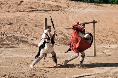 Preview: A Concept Photo Of A Roman Battle Of Two Warriors Of The Colosseum In Action With Aggressive