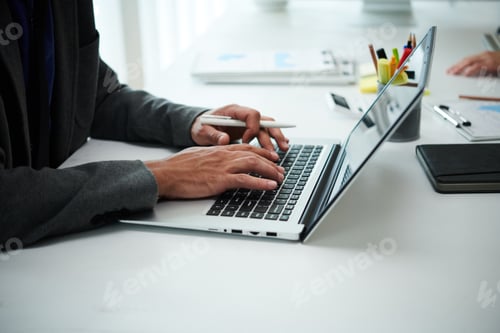 Preview: Solopreneur Working on Laptop