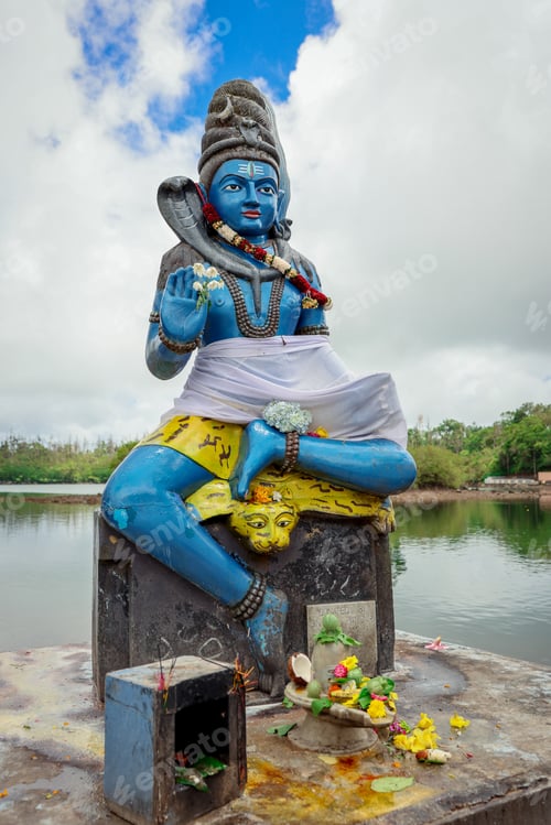 Preview: Hindu Statue Seated Atop Cement Block