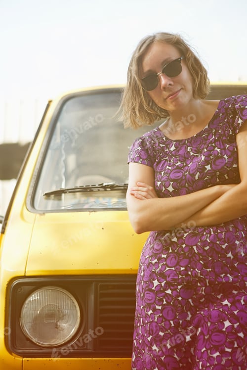 Preview: Dreaming girl leaning on van