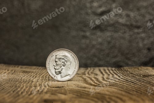 Preview: Closeup of old russian coin on a wooden background.