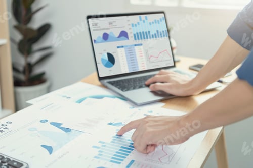 Preview: Businesspeople working in finance and accounting Analyze financial graph budget and planning