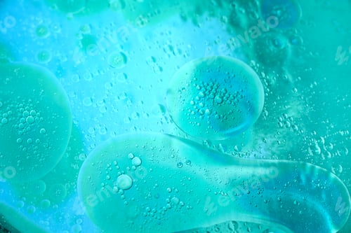 Preview: abstract turquoise green and blue background formed by oil drops on water