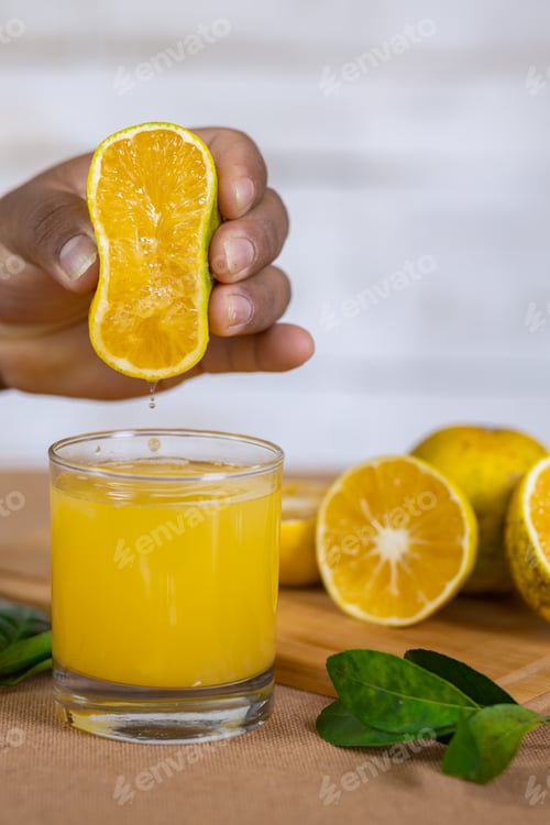Preview: orange juice served in a glass cup made with natural oranges