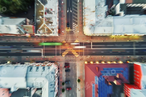 Preview: Crosroad in the city with blurred cars