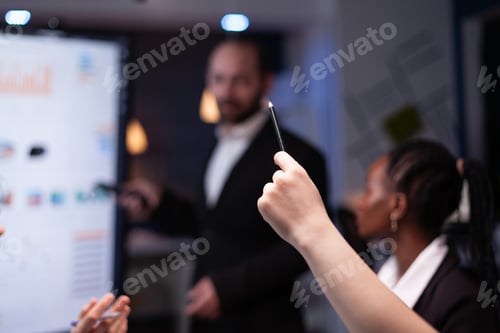 Preview: Selective focus of businesswoman leder sitting at desk analyzing marketing presentation discussing